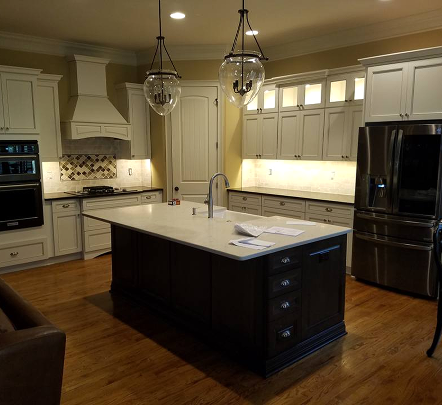 Modern kitchen with island and pendant lights