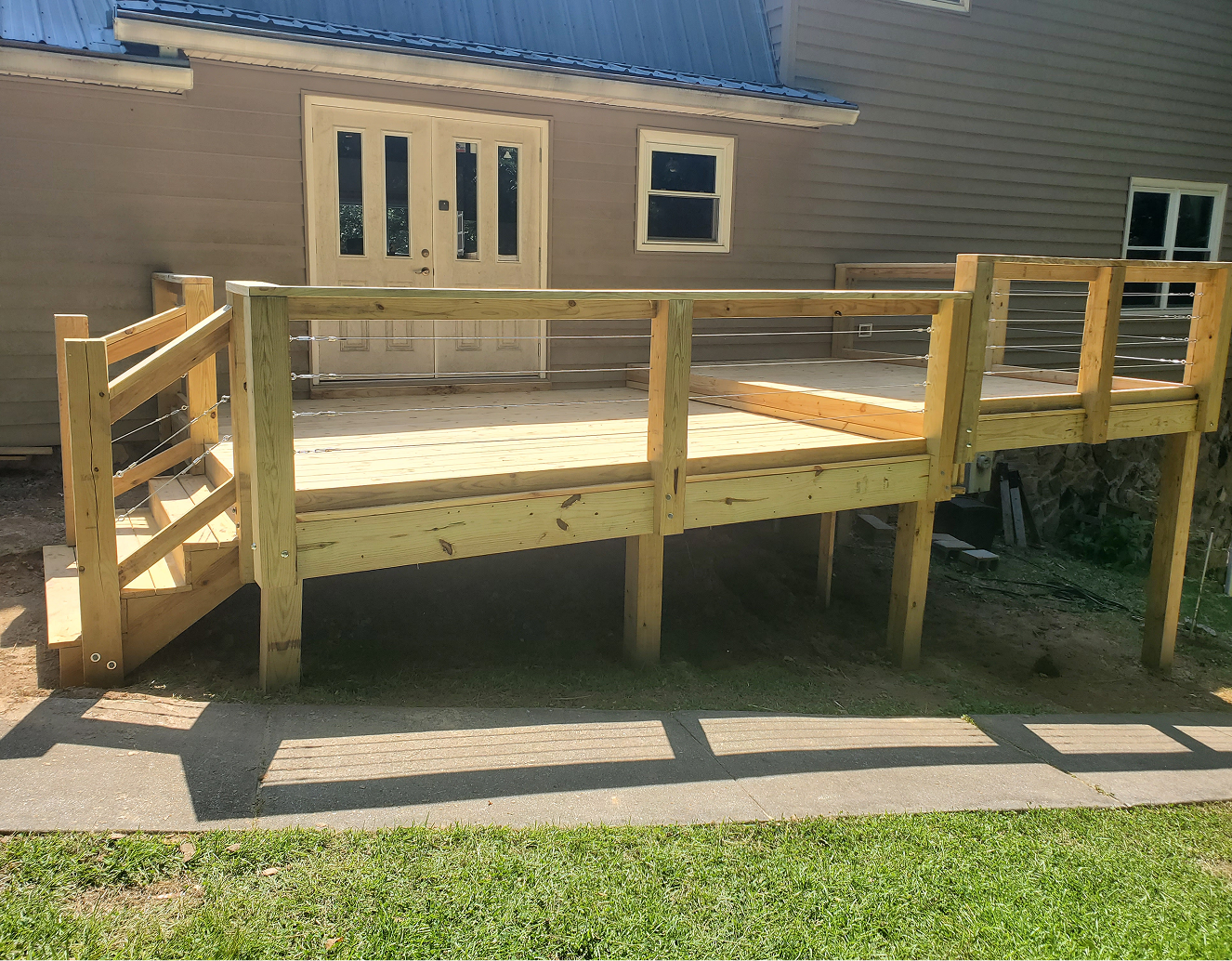Elevated backyard wooden deck