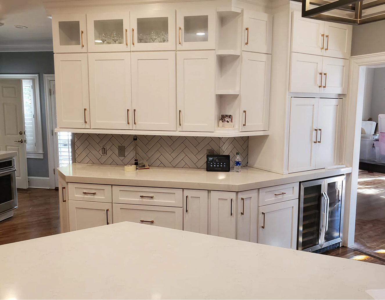 Spacious kitchen with chevron backsplash